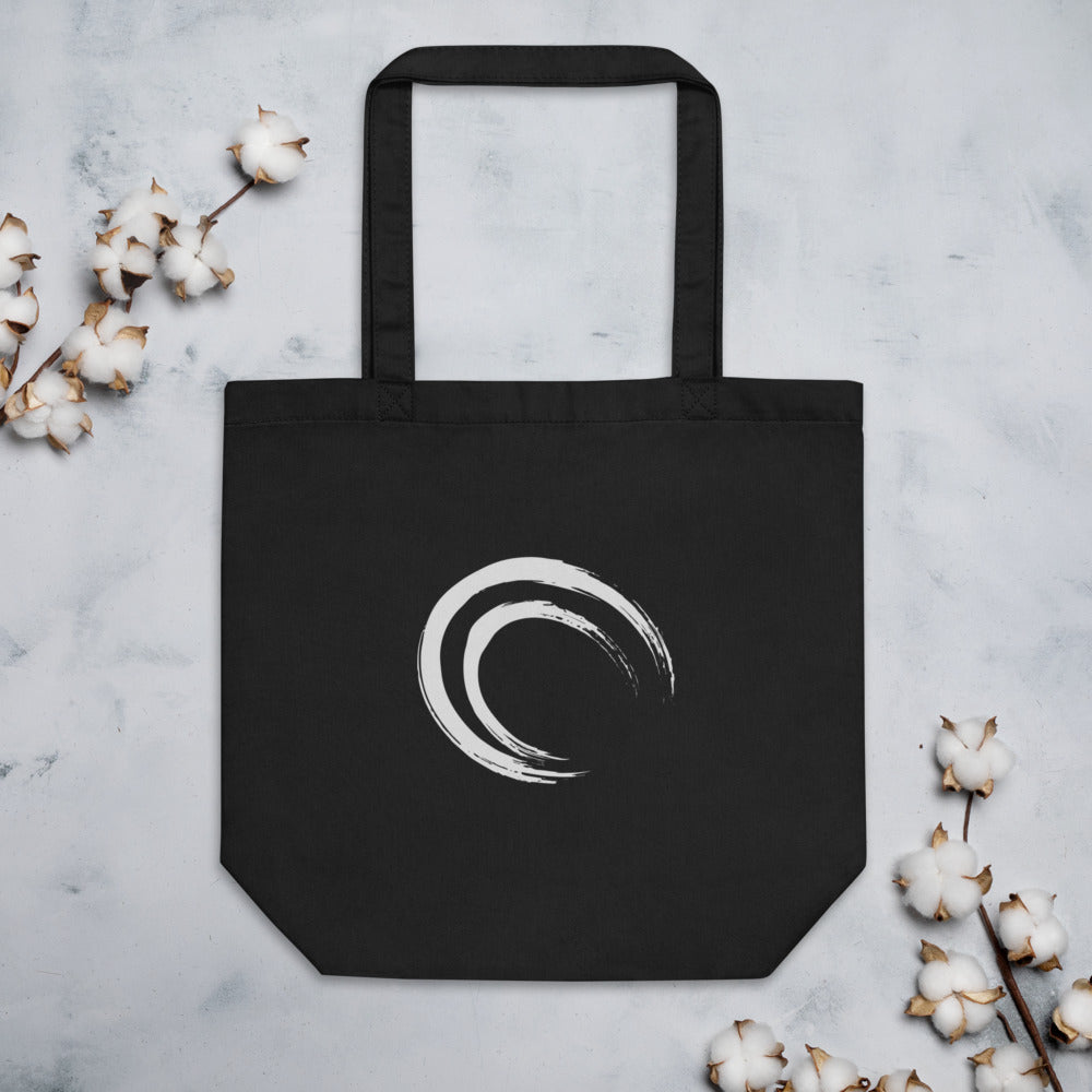 A double-layered crescent enso sumi-e design printed on a canvas tote bag. Flat lay, Ink colourway.