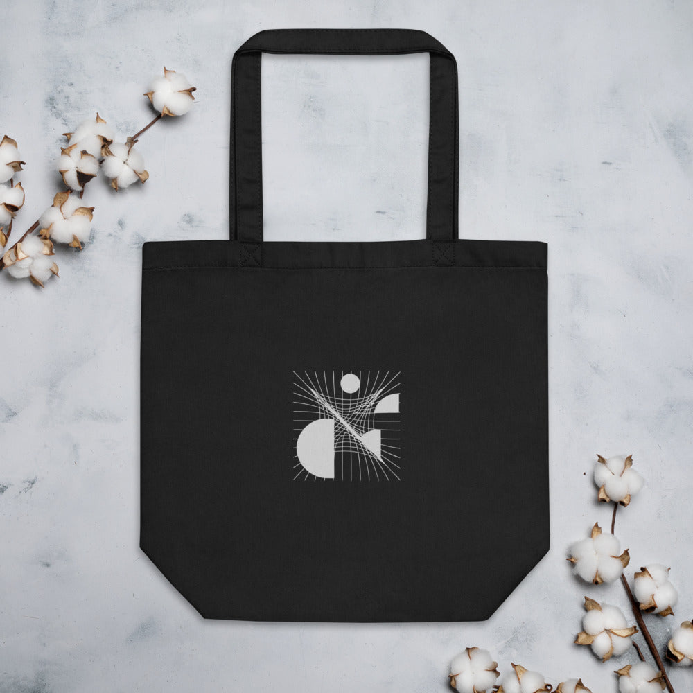 A minimalist sheared parallel grid design in precise hairline strokes on a tote bag. Flat lay, Ink colourway.