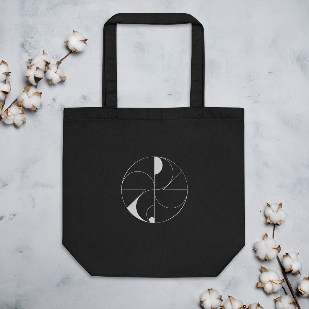 Hairline-weight vector illustration of dual overlapping spiric torus lobes printed on a minimalist tote bag. Flat lay, Ink colourway.