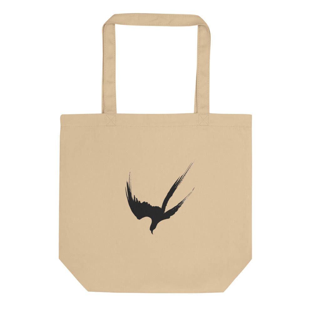 A minimalist three-stroke sumi-e hawk design with dry-brush texture printed on a tote bag. Shown on the Bone (Oyster) colorway.