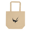 A minimalist three-stroke sumi-e hawk design with dry-brush texture printed on a tote bag. Shown on the Bone (Oyster) colorway.