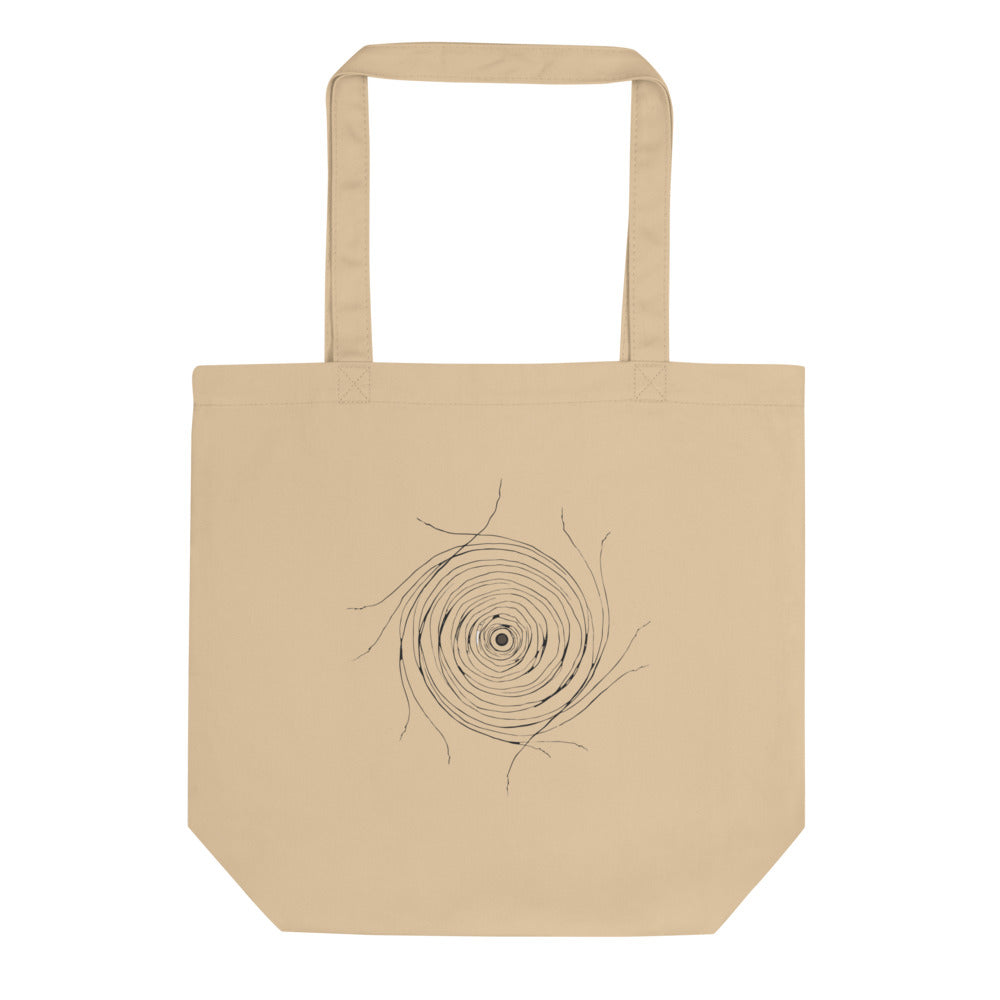 A minimalist celestial line art design mapping the radial filaments of the Helix Nebula on a canvas tote bag. Shown on the Bone (Oyster) colorway.