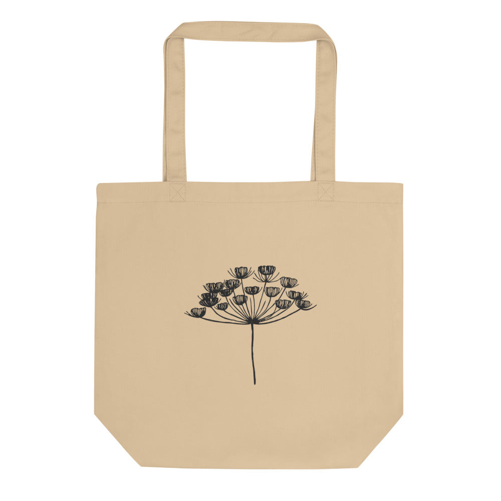 A fine-line botanical drawing of a dill seed umbel printed on a cotton tote bag. Shown on the Bone (Oyster) colorway.