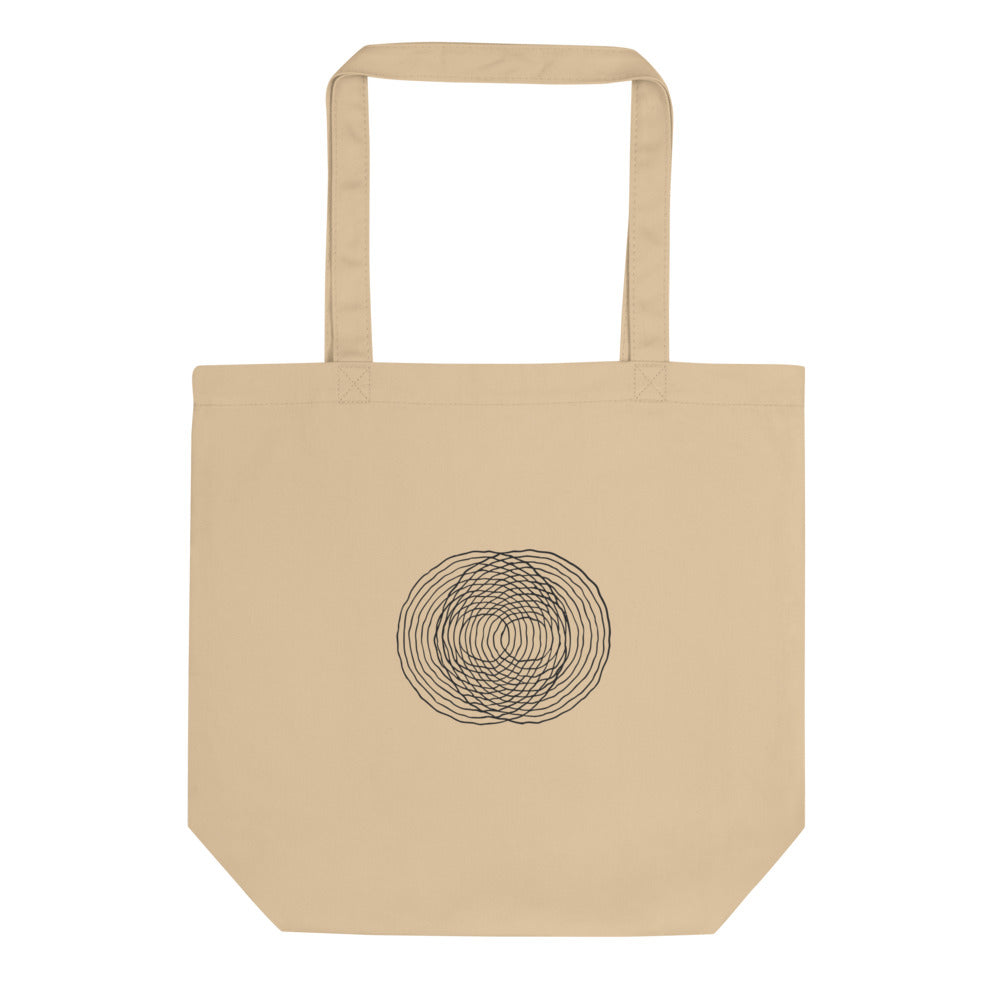A minimalist diagram of intersecting concentric raindrop ripple rings printed on a tote bag. Shown on the Bone (Oyster) colorway.