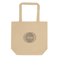 A minimalist diagram of intersecting concentric raindrop ripple rings printed on a tote bag. Shown on the Bone (Oyster) colorway.