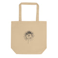 A precise line art drawing of a wild chervil seed umbel printed on a canvas tote bag. Shown on the Bone (Oyster) colorway.