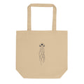 An atmospheric jellyfish specimen printed in minimalist line art on a tote bag. Shown on the Bone (Oyster) colorway.