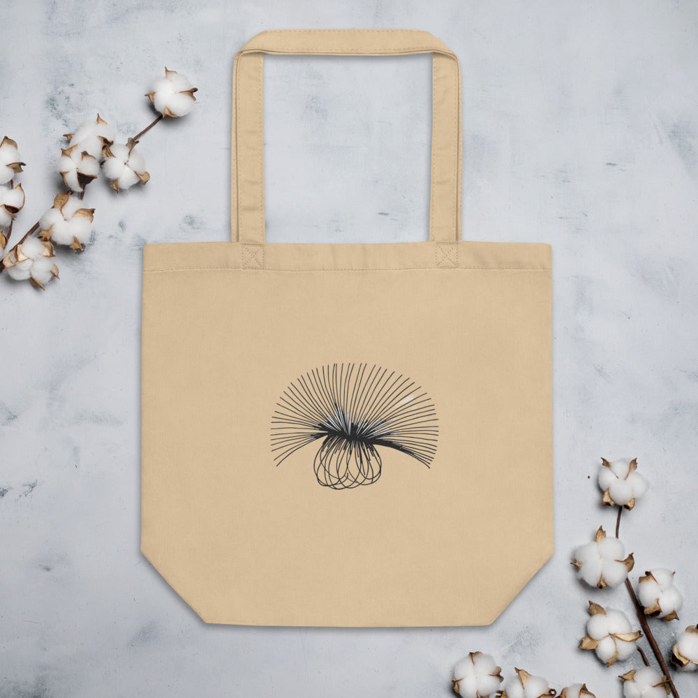 A minimal engraving-style line art study of a sow thistle seed head, printed on a tote bag. Flat lay, Bone colourway.