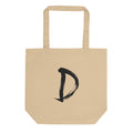 A minimalist sumi-e ink painting of the capital letter D printed on a tote bag. Shown on the Bone (Oyster) colorway.