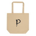 The letter P in black sumi-e brush calligraphy printed on a tote bag. Shown on the Bone (Oyster) colorway.