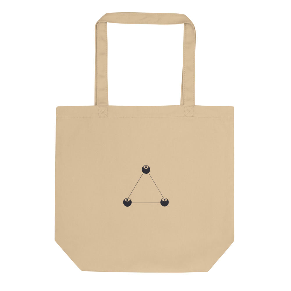 A minimalist line art design of three solid dots connected in an equilateral triangle, printed on a tote bag. Shown on the Bone (Oyster) colorway.