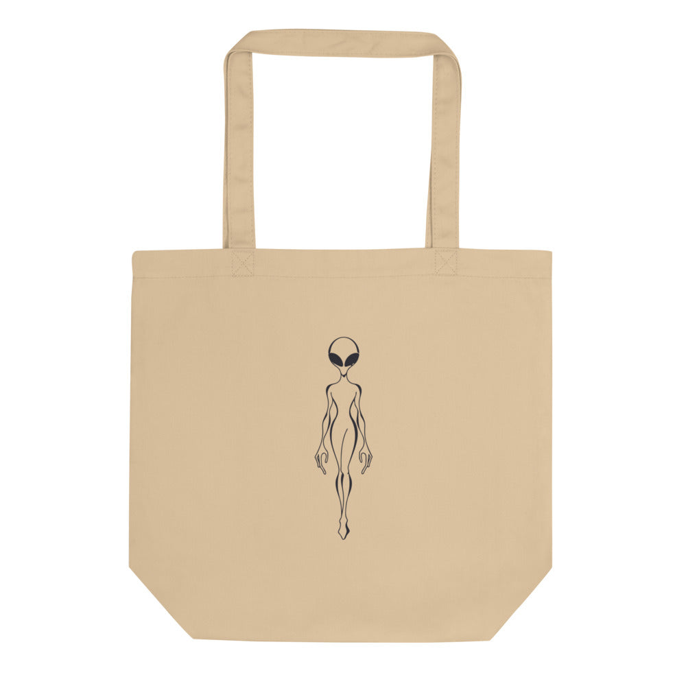 A minimalist black line drawing of a classic grey alien specimen with solid black eyes printed on a tote bag. Shown on the Bone (Oyster) colorway.
