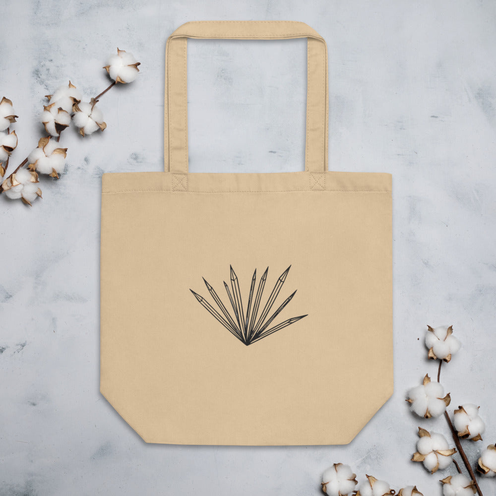 An isolated graphic of radiating hoarfrost crystal needles printed on a tote bag. Flat lay, Bone colourway.