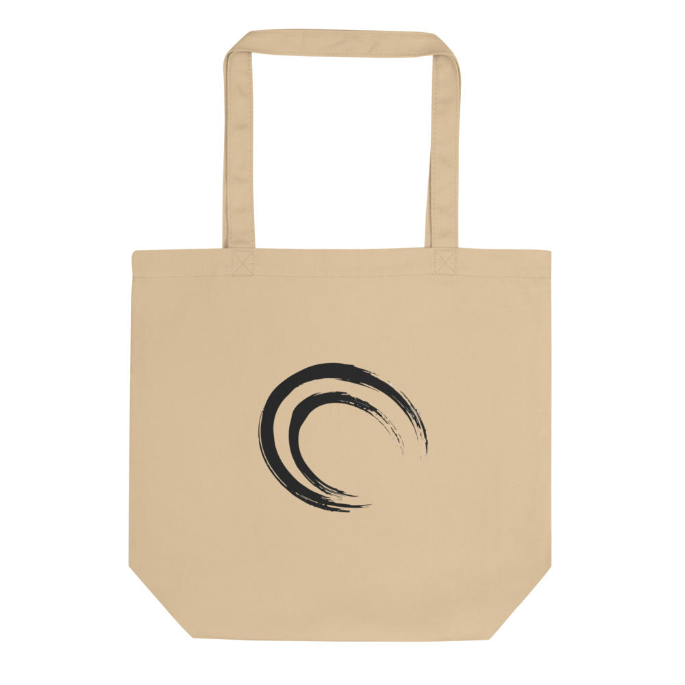 A double-layered crescent enso sumi-e design printed on a canvas tote bag. Shown on the Bone (Oyster) colorway.