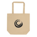 A nested double circle sumi-e brushstroke design printed on a tote bag. Shown on the Bone (Oyster) colorway.