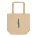 A botanical illustration of a running clubmoss vegetative branchlet printed on a tote bag. Shown on the Bone (Oyster) colorway.