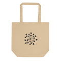 Fine hairline drawing of a lovage seed umbellule with radiating stems and ribbed seeds on a tote bag. Shown on the Bone (Oyster) colorway.