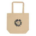 A detailed botanical line art illustration of a cumin seed umbellule printed on a tote bag. Shown on the Bone (Oyster) colorway.