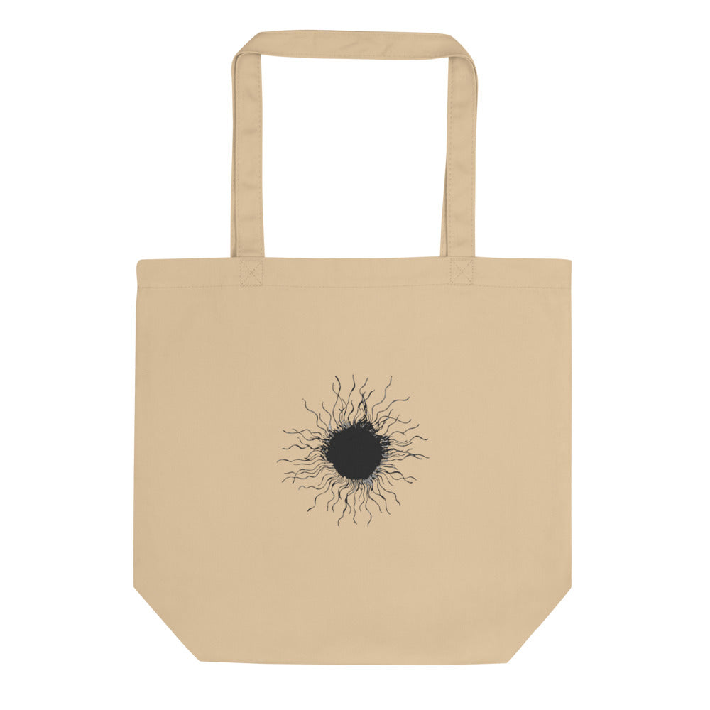 An ink-drawn diagram of a solar sunspot with radiating penumbra filaments printed on a tote bag. Shown on the Bone (Oyster) colorway.