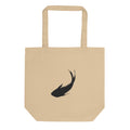 A minimal sumi-e ink brush painting of a single ascending carp printed on a tote bag. Shown on the Bone (Oyster) colorway.