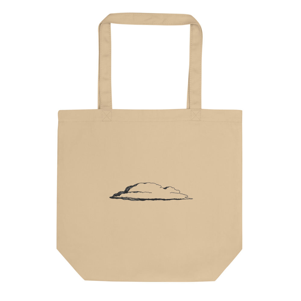 An engraving of a single stratus cloud in a broad horizontal band, printed on a cotton tote bag. Shown on the Bone (Oyster) colorway.
