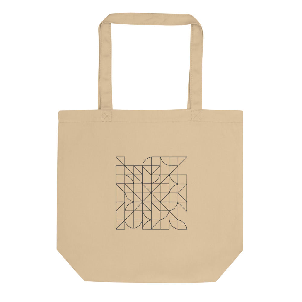 A dense, single-line self-avoiding walk path graphic in hairline weight on a tote bag. Shown on the Bone (Oyster) colorway.