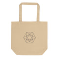 A regular heptagon subdivided into interlocking triangles and outer radiating facets in clean hairline stroke art on a tote bag. Shown on the Bone (Oyster) colorway.