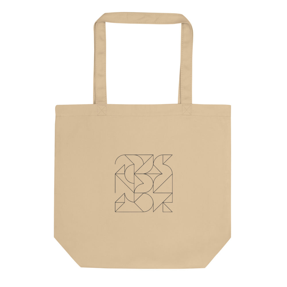 A modular grid of interlocking Wang tiles in thin hairline lines printed on a tote bag. Shown on the Bone (Oyster) colorway.