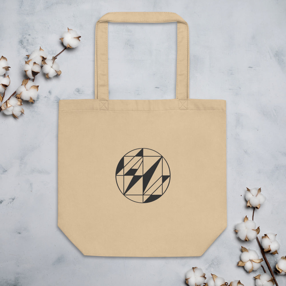 A Delaunay triangulation network of triangular facets in hairline weight, printed on a classic tote bag. Flat lay, Bone colourway.