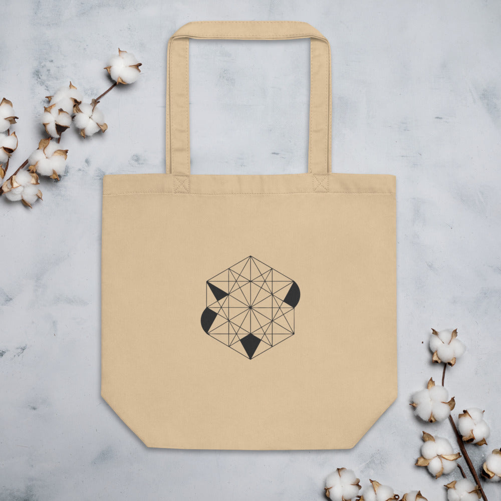 A close-up of a tri-hexagonal Kagome lattice pattern with interlocking stars and hexagons in fine lines on a tote bag. Flat lay, Bone colourway.