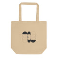 A sequence of nested Cassini ovals in fine hairline weight, transitioning from two loops to a flattened ellipse on a tote bag. Shown on the Bone (Oyster) colorway.