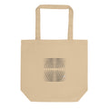 A grid of horizontal line segments decreasing in density radially from a central focal point, printed on a cotton tote bag. Shown on the Bone (Oyster) colorway.