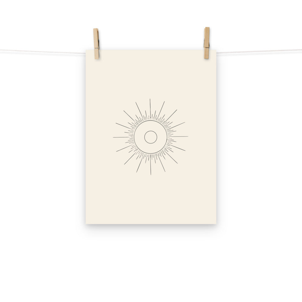 An annular solar eclipse celestial geometry diagram with concentric circles and fine ray lines on an art print. Hung with wooden pegs, 12″×16″ size.