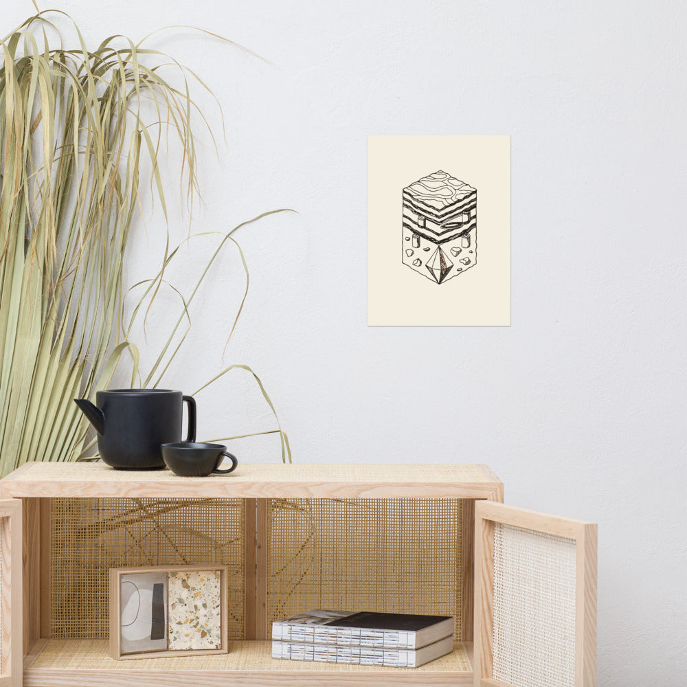 An orthographic line drawing of a calcite scalenohedron crystal printed on an art print. Above a rattan cabinet, 12″×16″ size.
