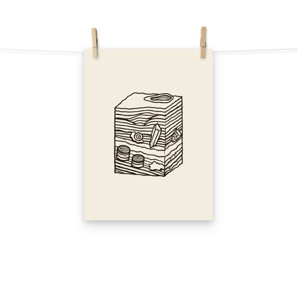 An angular unconformity geological cross-section in minimalist line art printed on a paper art print. Hung with wooden pegs, 12″×16″ size.