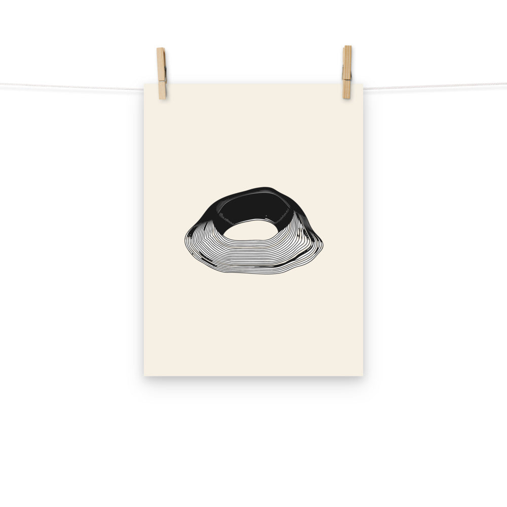 A minimal topographic design of concentric contour lines mapping a kettle lake basin, printed on an art print. Hung with wooden pegs, 12″×16″ size.
