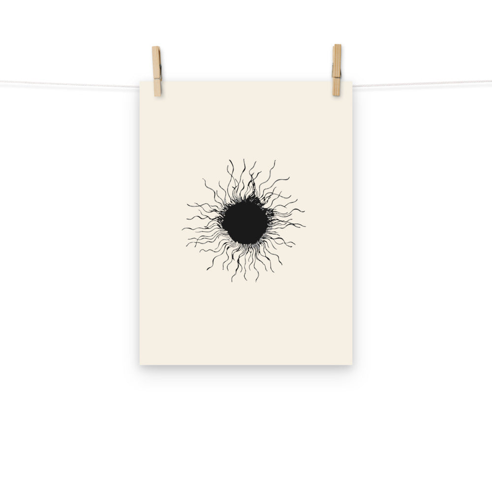 An ink-drawn diagram of a solar sunspot with radiating penumbra filaments printed on an art print. Hung with wooden pegs, 12″×16″ size.