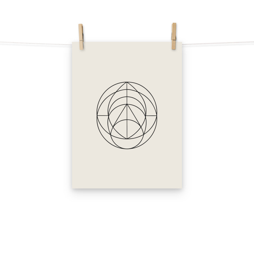 A minimalist geometric print of nested cardioid curves in hairline weight on an art print. Hung with wooden pegs, 12″×16″ size.