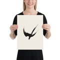 A minimalist three-stroke sumi-e hawk design with dry-brush texture printed on an art print. 12″×16″ size.