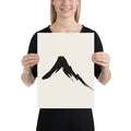 A single downward sumi-e ink brush stroke depicting a steep volcanic mountain slope on an art print. 12″×16″ size.