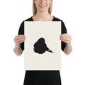 A minimalist resting sparrow printed in black sumi-e ink on an art print, showing a single wet brushstroke body. 12″×16″ size.