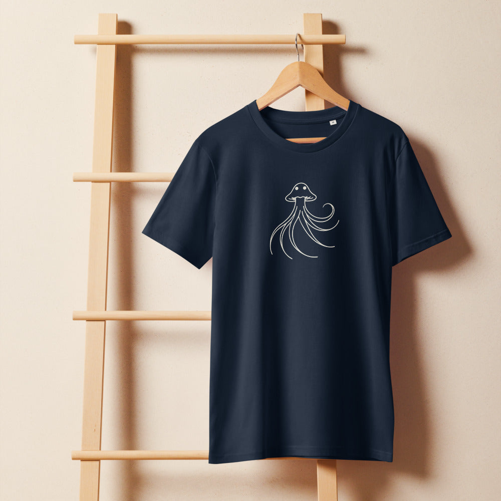A minimalist line art drawing of a translucent atmospheric floater with elegant trailing arms printed on a t-shirt. On a wooden hanger, Ink colourway.