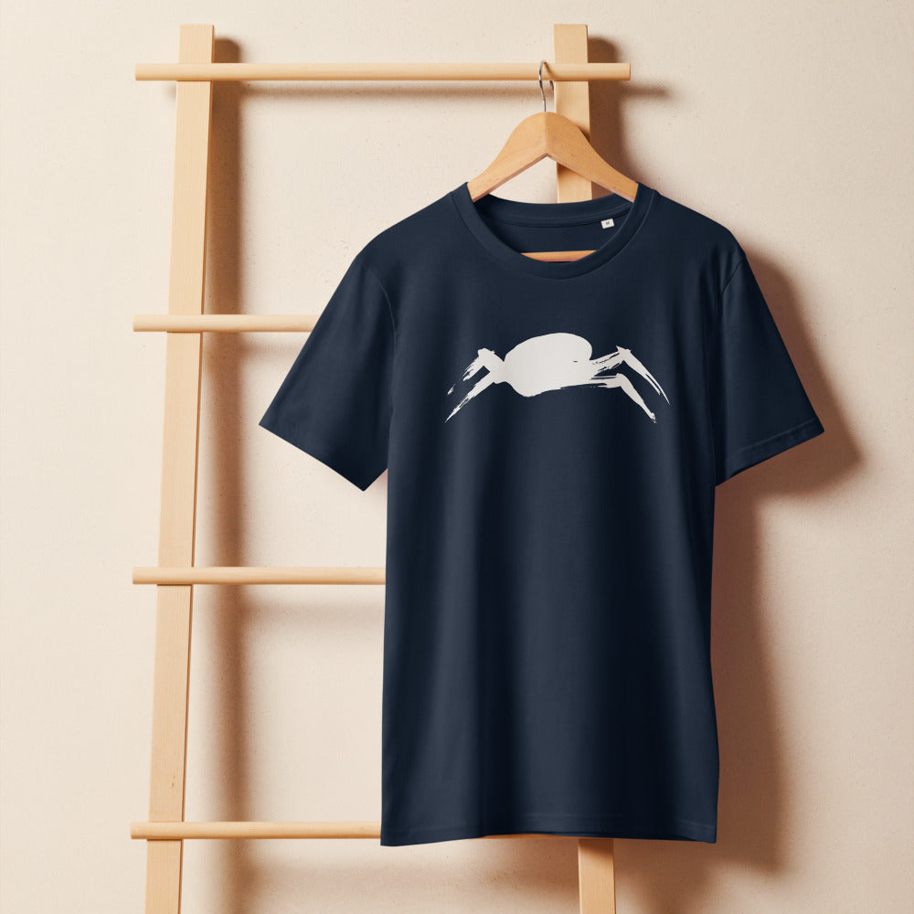 A minimalist sumi-e ink painting of a crab shell and legs printed on a t-shirt. On a wooden hanger, Ink colourway.