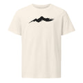 A single horizontal fractured dry-brush sumi-e ink stroke representing a rugged mountain ridge, printed on a t-shirt. Shown on the Bone (Vintage White) colorway.