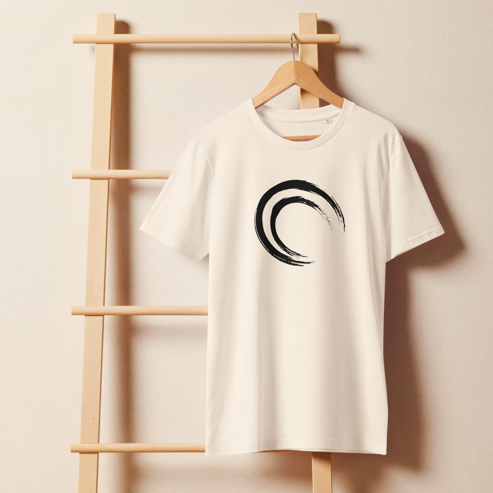 A double-layered crescent enso printed in black ink on a casual t-shirt. On a wooden hanger, Bone colourway.