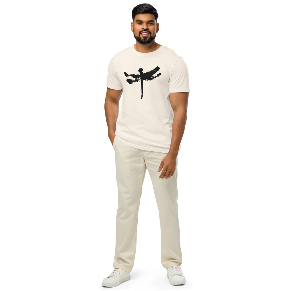 A minimalist dragonfly sumi-e ink design printed on a t-shirt. Worn by a man, Bone colourway.