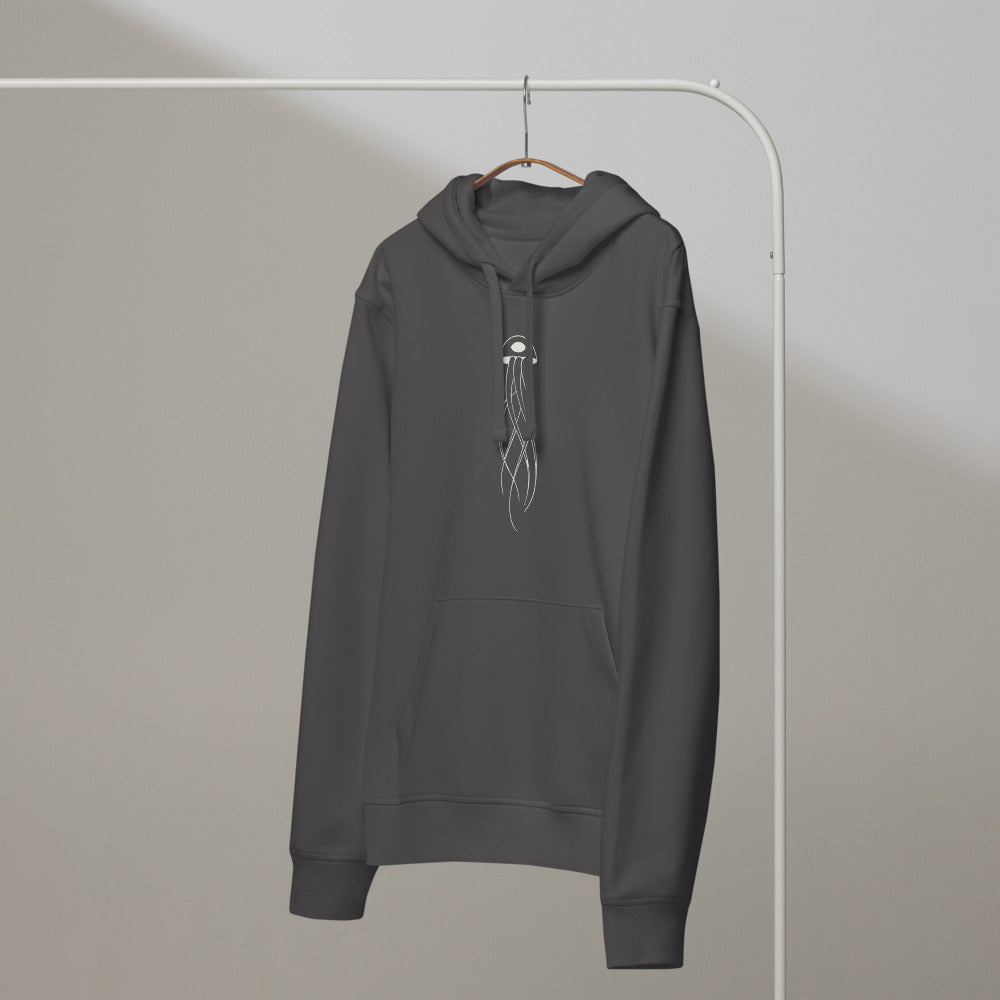 An atmospheric jellyfish specimen printed in minimalist line art on a hoodie. On a hanger, Slate colourway.