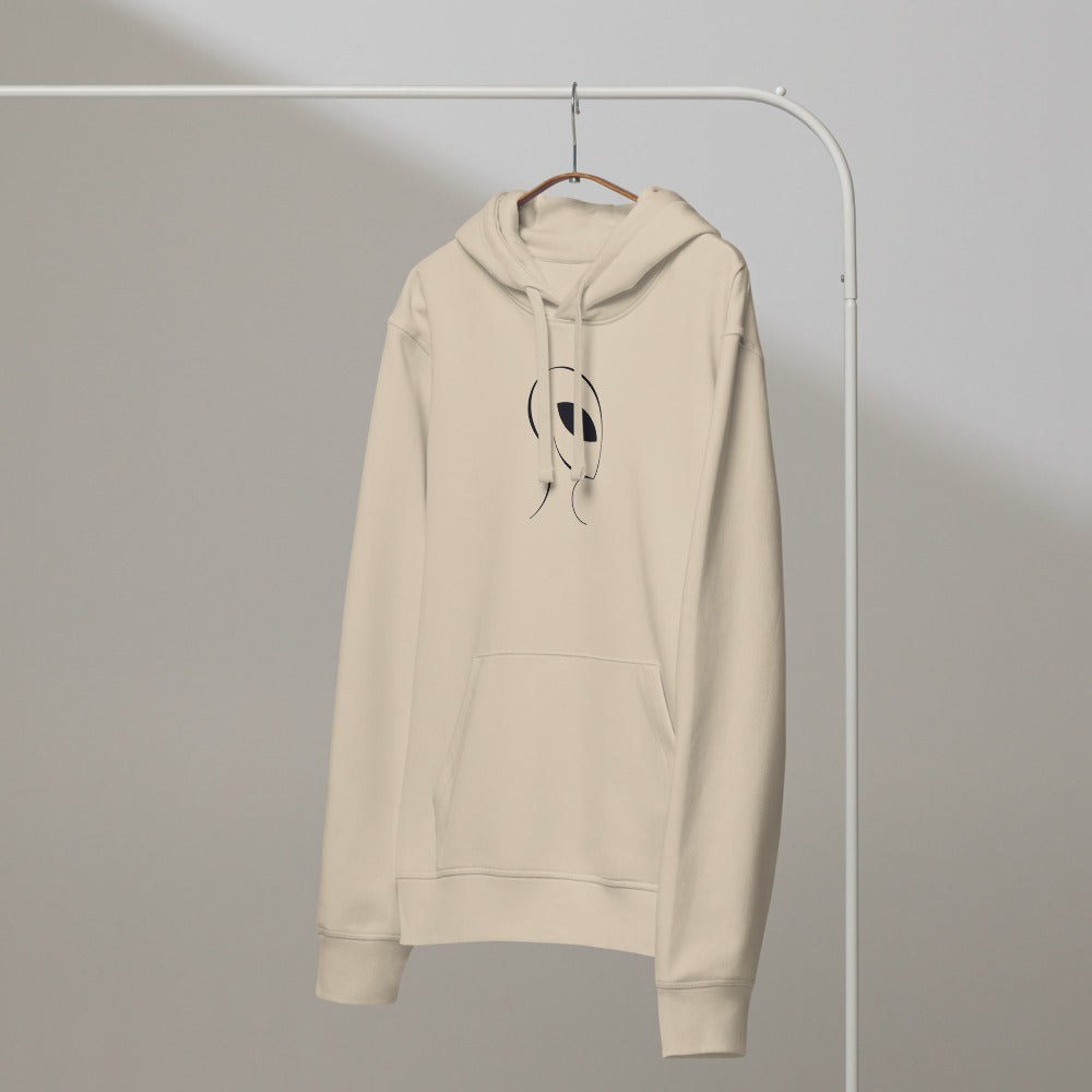 A clean line drawing of an alien visitor profile with a solid black almond-shaped eye printed on a hoodie. On a hanger, Clay colourway.