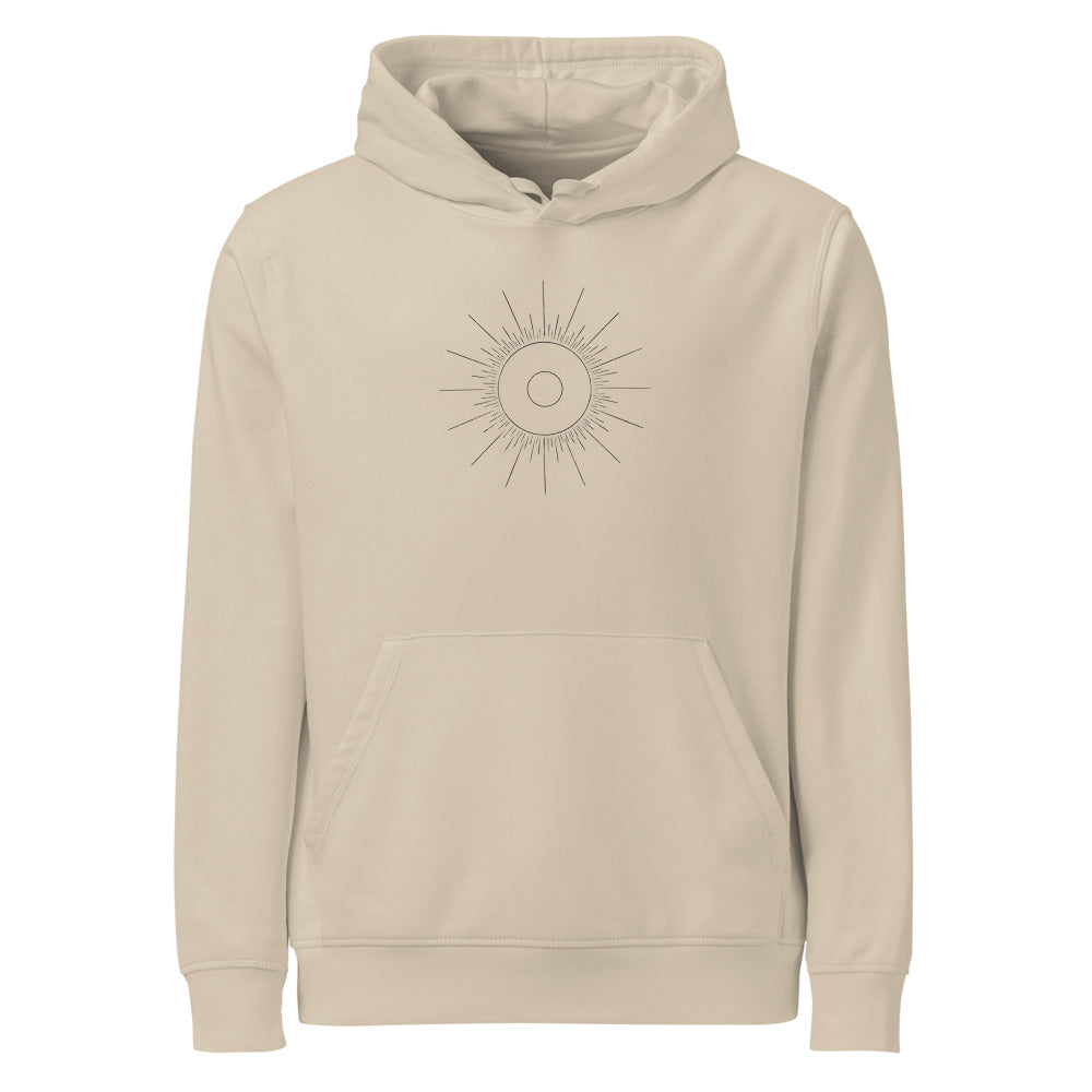 An annular solar eclipse celestial geometry diagram with concentric circles and fine ray lines on a hoodie. Shown on the Clay (Desert Dust) colorway.