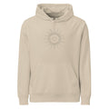 An annular solar eclipse celestial geometry diagram with concentric circles and fine ray lines on a hoodie. Shown on the Clay (Desert Dust) colorway.